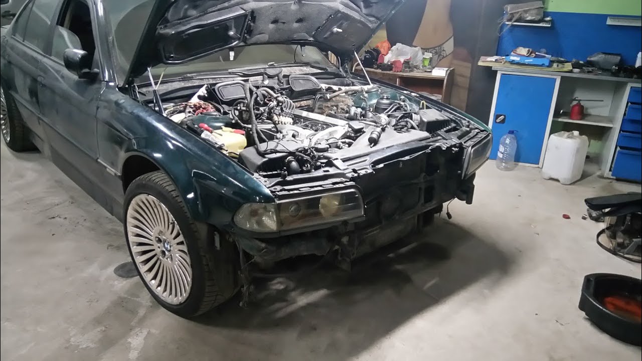 Бмв 750 i е38