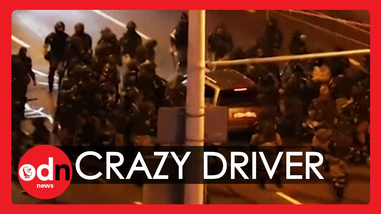 Officers in Belarus Pound Car With Batons After It Speeds Through Police Checkpoint