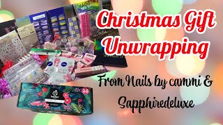 CHRISTMAS GIFT UN WRAPPING SAPHIRE AND NAILS BY CAMMI