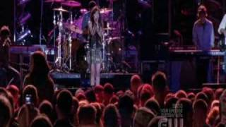 Mia's performing "You Can't Break A Broken Heart" on USO Concert