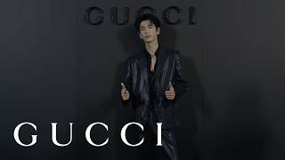 Guests at the GucciCore Fashion Show