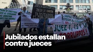 Pensionados protestan por recorte de hasta 70% en sus ingresos Pensionados protestan por recorte de hasta 70% en sus ingresos