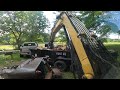 Excavator and dump trailer work