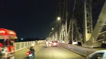 Vivekananda Setu a.k.a Bally bridge with a view of Dakshineshwar Temple across River Ganges.