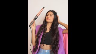 Useful tips to curl your hair with a curling wand.