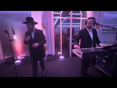 Motty Brier on the keys & Hershey Weinberger @ Moschel & Huffman beautiful Chuppah