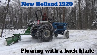 Plowing Snow with a Back Blade