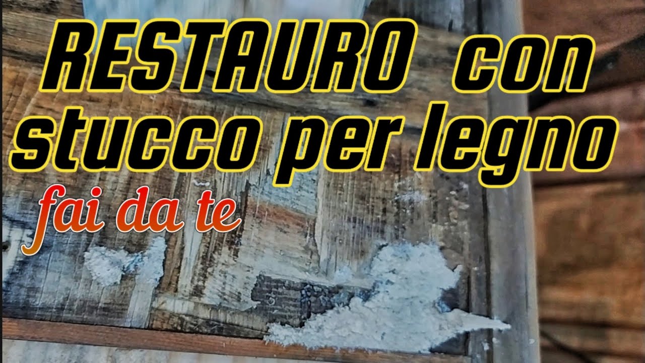 Restauro portone in legno con stucco fai da te