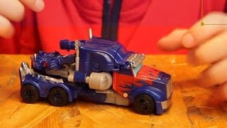 Игрушка трасформер Оптимус Прайм 4. Одним движением. Transformers Age of Extinction Optimus Prime(Игрушка Трансформер Оптимус Прайм 4. Видео Обзор трансформера Hasbro (Хасбро), трансформация одним движением...., 2015-03-01T22:37:37.000Z)