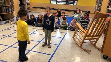 Ms. Fiorentini’s class practicing human coding