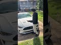 Watching car reviews on the car you already own
