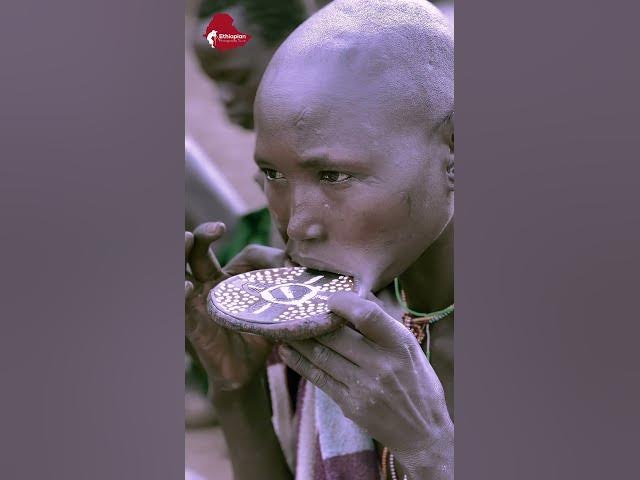Mursi women are famous for their wooden and Clay lip plates a symbol of beauty and identity.