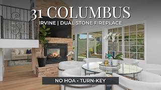 31 Columbus | White Kitchen, Two Room Stone Fireplace & Natural Light Throughout