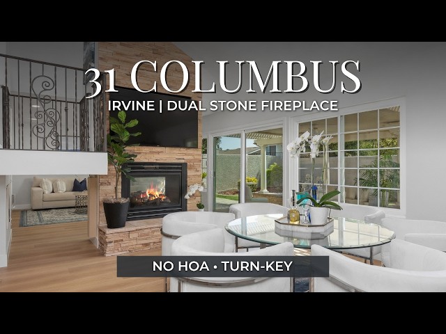 31 Columbus | White Kitchen, Two Room Stone Fireplace & Natural Light Throughout