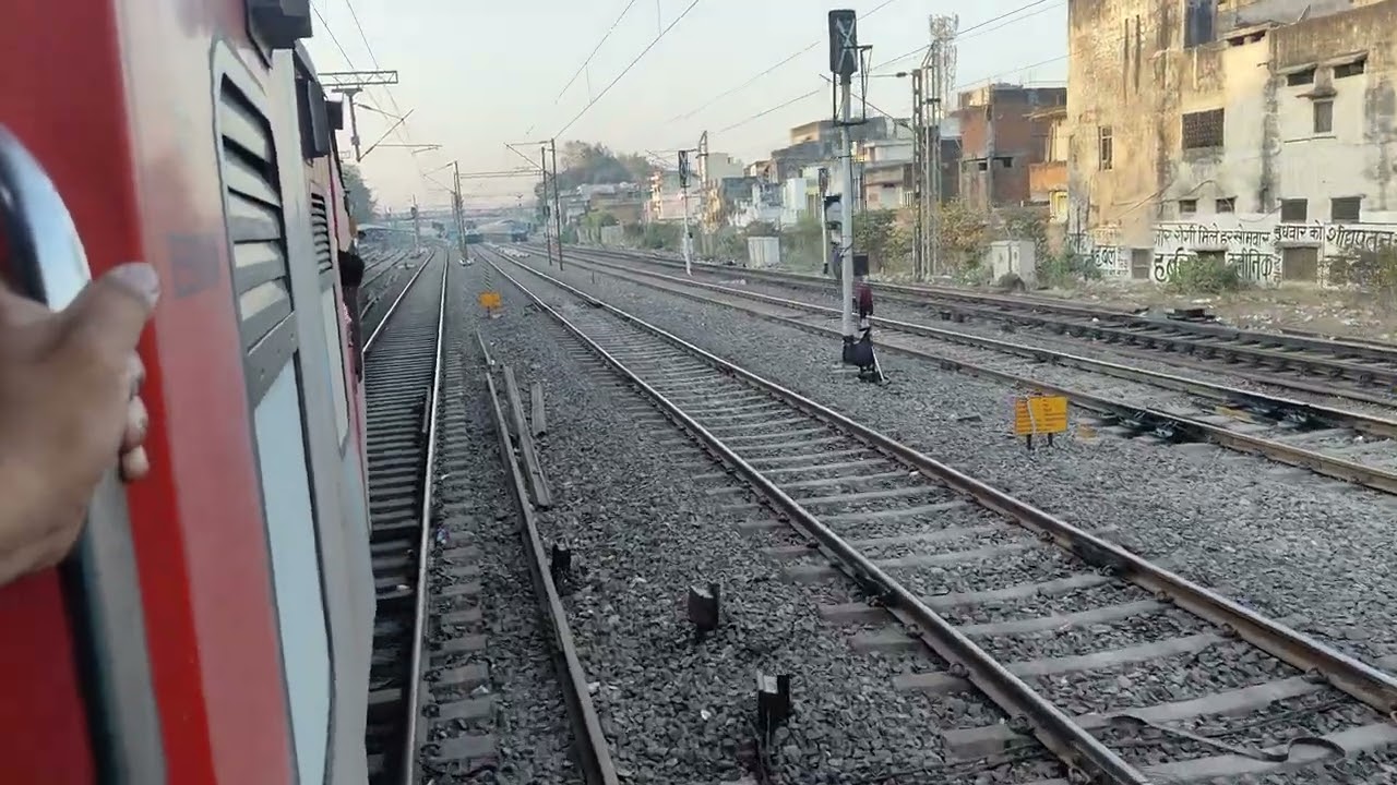 Clips of danapur udhna express arriving at katni station