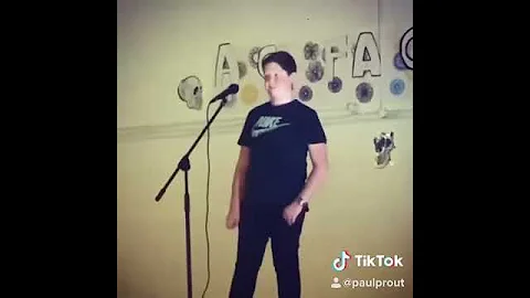Paul prout singing dance monkey at a school compet...
