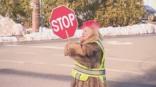 Crossing guard goes viral for her colorful, glamorous outfits