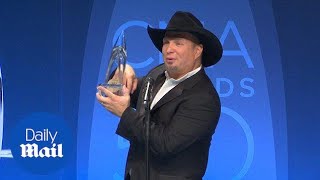 CMA Awards: Dolly Parton and Garth Brooks discuss winning - Daily Mail