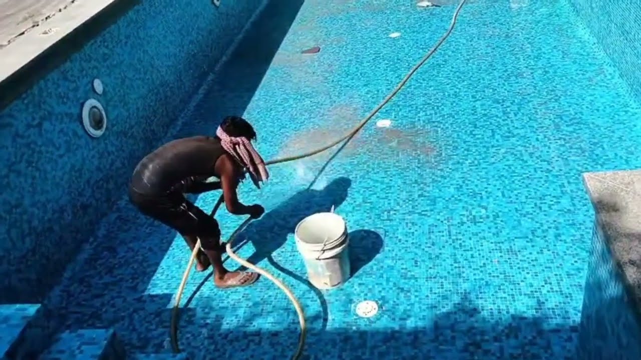 Before and After Swimming pool construction applying of glass mosaic tiles