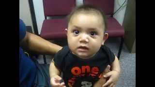 Baby gets his hearing aids & does he cry?