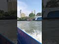 Riding a boat in Thailand