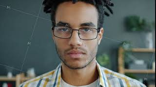 Slow Motion Portrait Of Serious African American Man Hipster Looking At Camera At Home