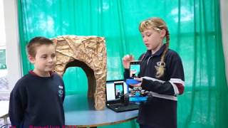 Young ICT Explorers demonstrating their Topography Pup and the game Sea It Rise.