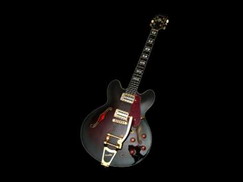 Douglas WNO-650 semi-hollow guitar doing a Cortez-Floyd thing