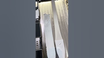 Elastic adhesive under an iPhone battery and best way to remove it