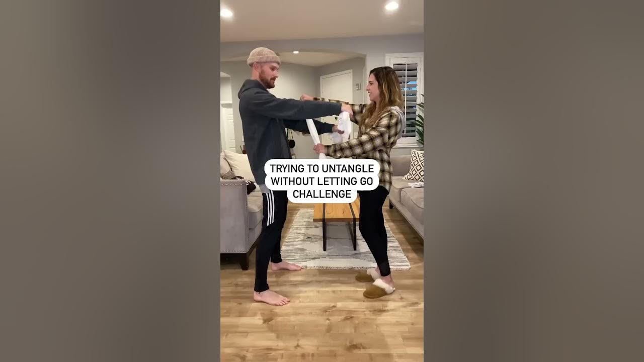 Trying to UNTANGLE WithOut Letting Go Couples Challenge! (IMPOSSIBLE