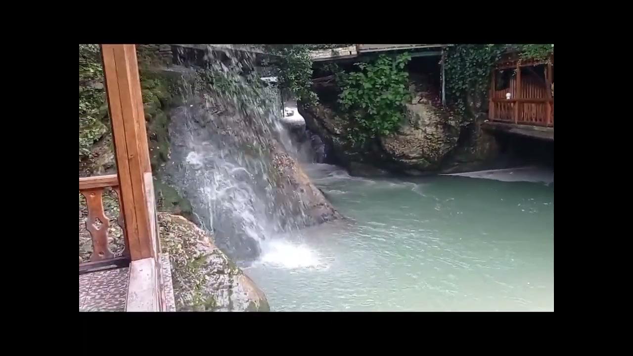 Покажи видео абхазия. Ткуарчал абхазия водопады. Озеро гуарап абхазия. Озеро рица пляж внучки. Иверский водопад абхазия.