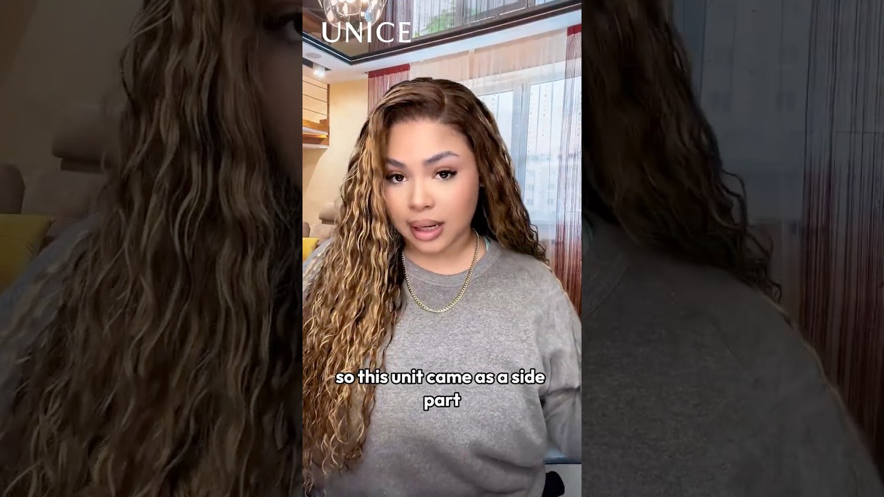 Парик UNice теплого карамельно-коричневого цвета с мелированием и мягкими волнами.