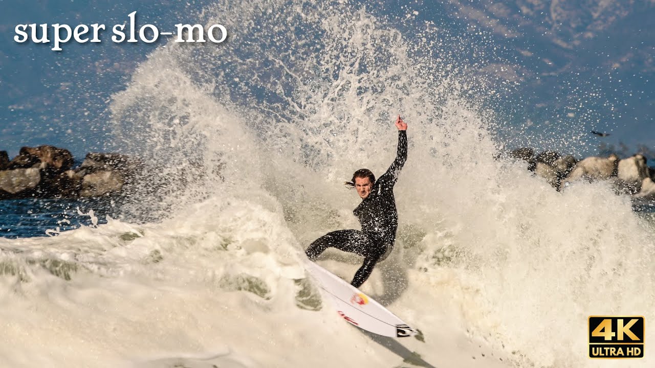PRO SURFERS SHREDDING LARGE JETTY WAVE SLOW MOTION SURFING 4K YouTube