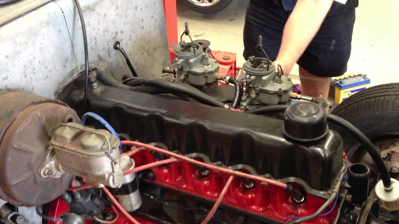 265 hemi first start up custom dual carb manifold YouTube