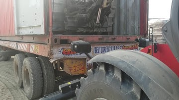 UNLOADING FROM CONTAINER