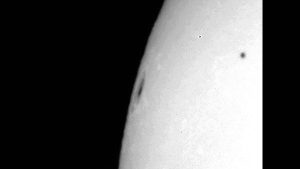 Large Sun Spot and a Satellite Transit of the Solar Disc
