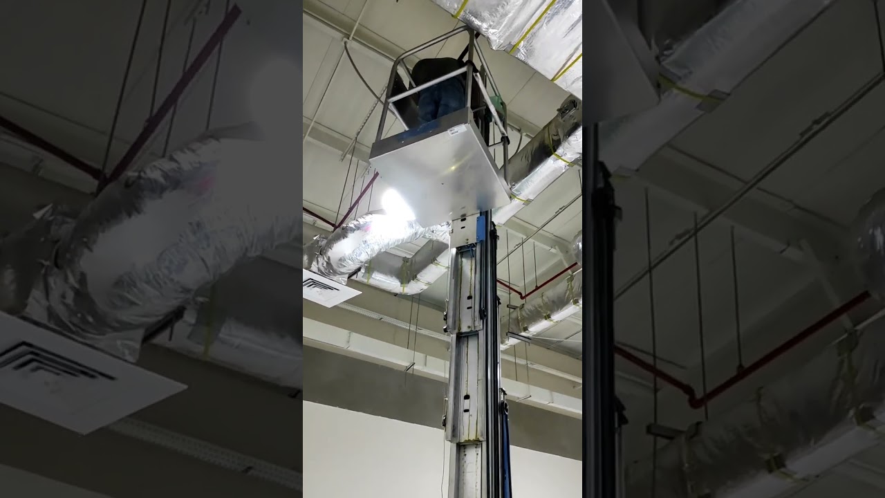 Smoke Detector installation # fire alarm system installation # Genie AWP S-40 # single man lift