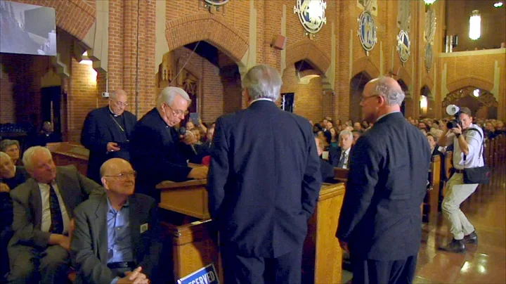 Fr. Michael Perry thanks Michael Quimby and Bob Sc...
