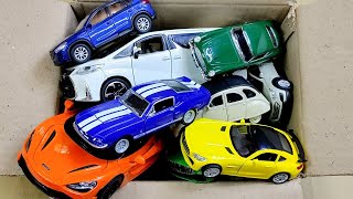 Box Full Of Model Cars, Peugeot, Jaguar, Rolls Royce, Pagani, Hyundai, Cadillac One, Opel, DHL