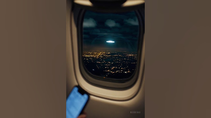 Night Flight Surprise: Passenger Captures Eerie UFO Through Airplane Window #UFOsighting