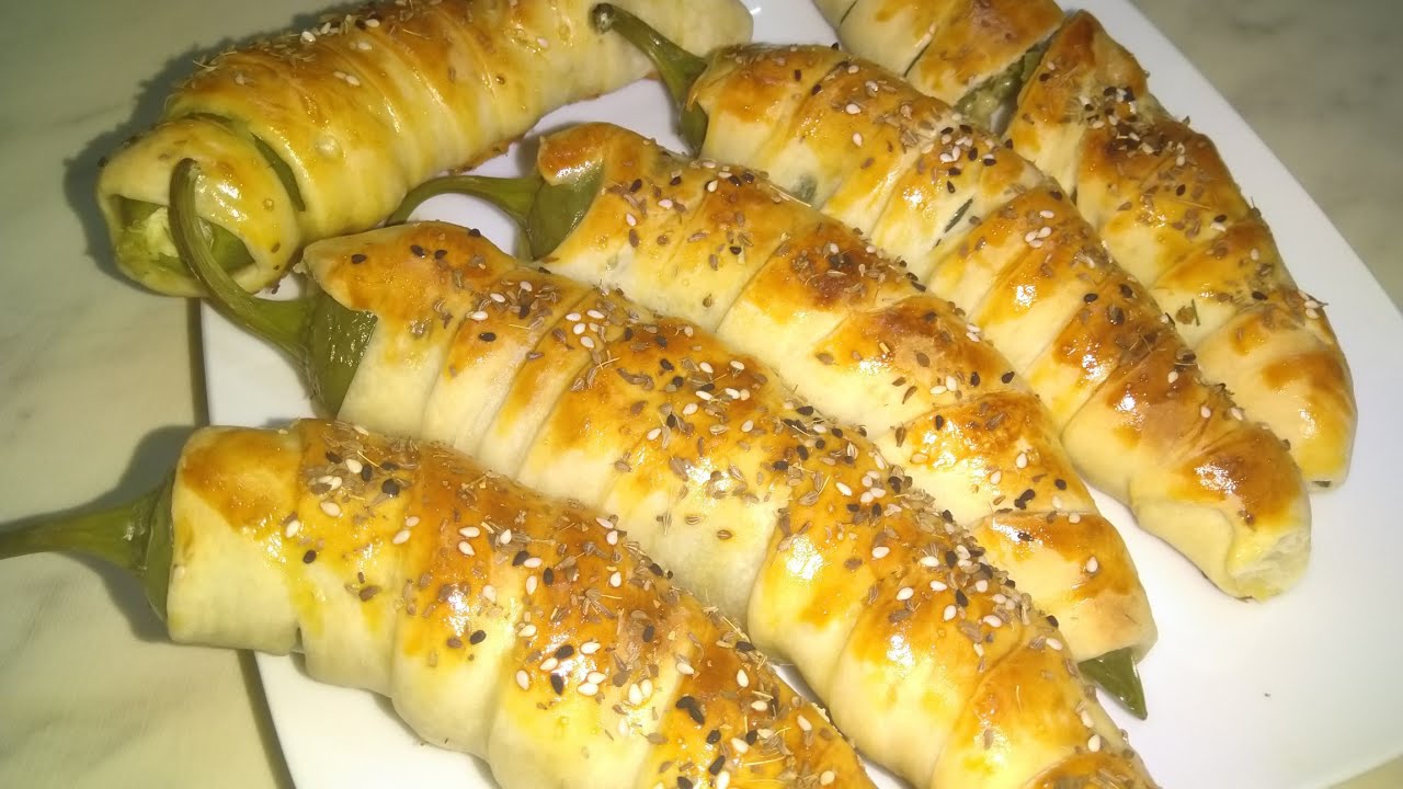 فلفل محشي في الفرن ملفوف في العجينة السحرية نودكم ولا نشهيكم(وصفات رماضنية)