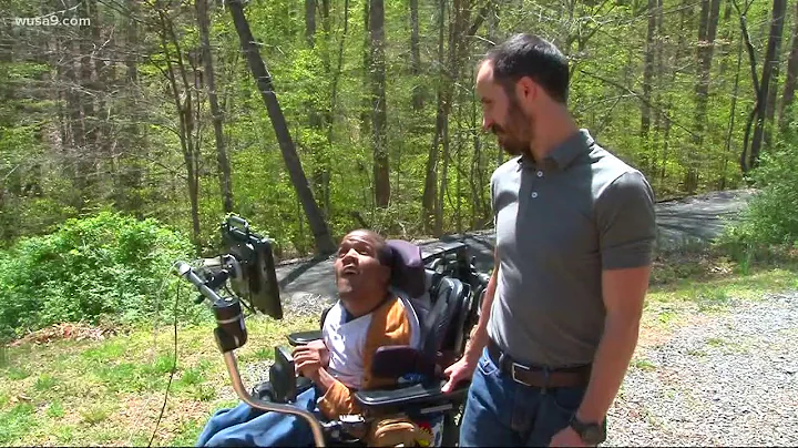 Young man in wheelchair defies odds, scales rock c...