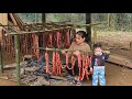 Single mother sausage making process an ancient way of cooking meat in the intestines