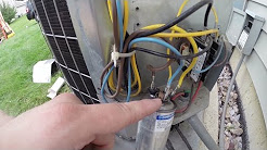 Carrier Air Conditioning Unit Repair: Capacitor Replacement