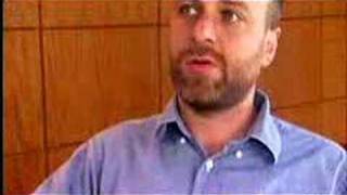 John Mcenroe Raises A Racket