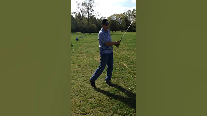 Gary Hitting Golf Balls