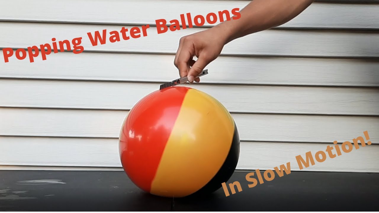 Popping Water Balloons In Slow Motion! slowmotion YouTube