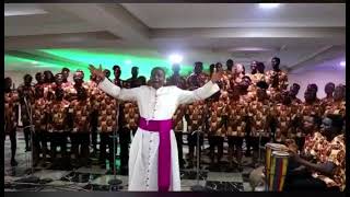 Bishop Godfrey Igwebuike Onah conducting a choir. Humility at its peak