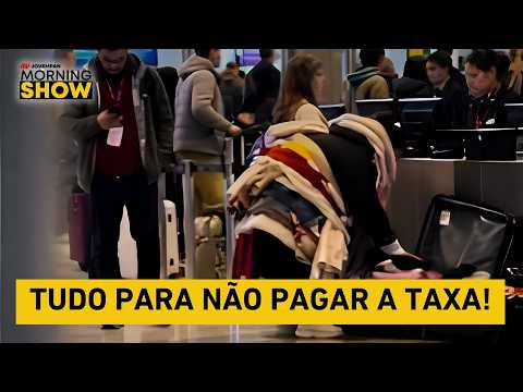 Stopped at boarding, woman wears multiple layers of clothing to avoid baggage fees