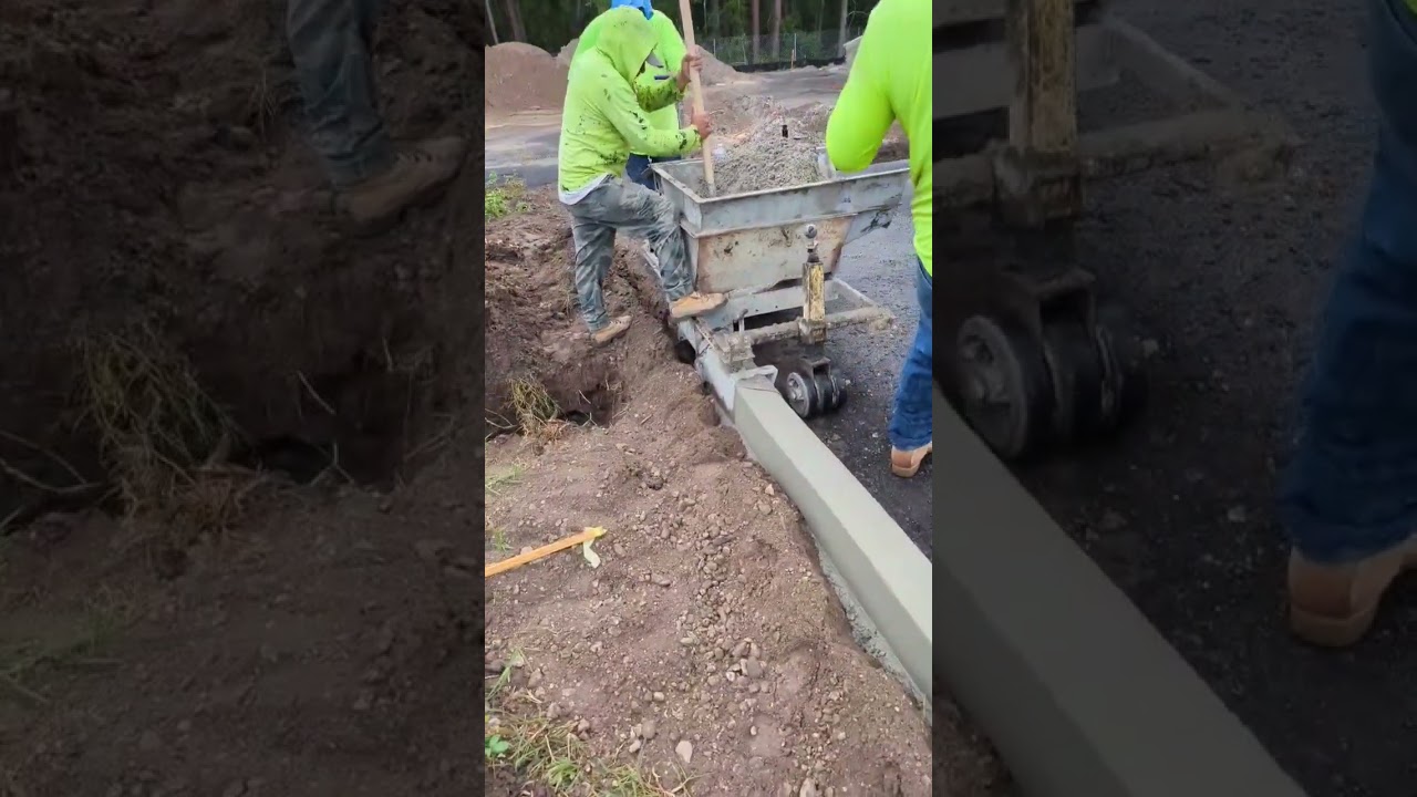 Curb machine operating 